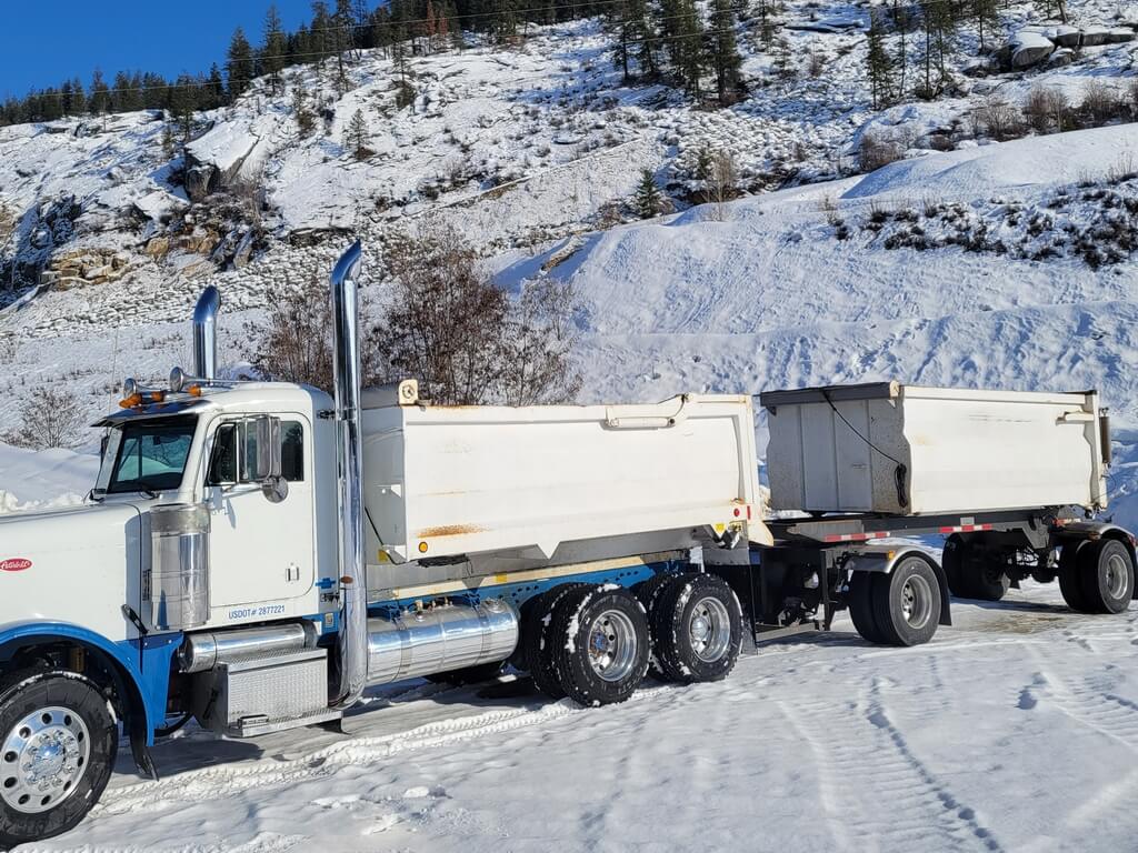 Dump truck with transfer trailer